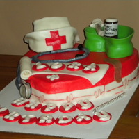 Nurses Cake This cake is buttercream cake with fondant accents. She loved it