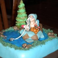 Gone Fishing made this for my daughter's baby shower hand sculpted everything out of fondant was a big hit. My first tier cake