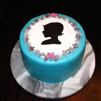 Silhouette Portrait Cake Fondant-covered chocolate cake with vanilla buttercream filling. The base is covered in fondant as well. Just a concept I had for something...