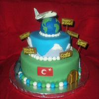 Travel Bug Bday Cake Airplane and globe made of gumpaste