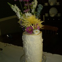 Vase Cake I used 4 6" layers, which I tapered to look like one of my Lenox vases. I cut the top out and inserted a plastic bottle I had cut to...