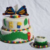 Very Hungry Catterpillar Lemon Rasberry cake with vanilla and chocolate smash cake.. Handpainted butterfly.