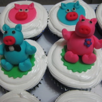 Piglets In My Pigpen Cuppies A friend asked me to make cuppies with little piggys as a topper.These are chocolate moist cupcakes iced with boiled icing and the cute lil...