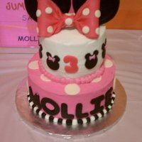 Minnie Mouse This was inspired by another CC post (can't remember the name). Top tier covered in BC with MMF accents. White cake with chocolate...
