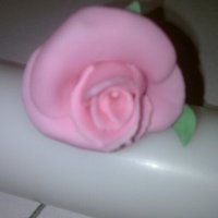 Small Fondant/gumpaste Rose This is my 1st ever attempt at fondant/gumpaste roses. I have made chocolate ones but have been struggling with these. Not real happy but I...
