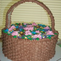 Basket Of Flowers This basket of flowers was made ut of 10" rounds, decorated with BC. The handle is a piece of foam core board, wrapped in contact...