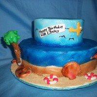 Beached Themed Birthday Cake Beach themed birthday cake, BC airbrushed with MMF sea shells, airplane, and other accents. Graham cracker sand. Only the 2nd time using...