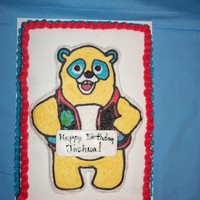 Special Agent Oso 1/4 sheet cake with Special Agent Oso. Decorated in BC.