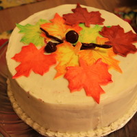 Fall Leaves Red Velvet Cake Red velvet cake with homemade cream cheese frosting and fondant leaves & acorns.