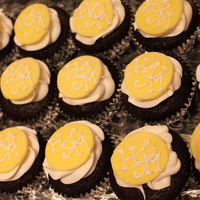 Monogrammed Wedding Cupcakes These cupcakes were partnered with the mini yellow cake I made for a coworker who eloped. Each cupcake is chocolate with white buttercream...