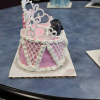 Side View Of Princess Of Marc Jacobs Cake Birthday cake for a girl who is obsessed with Marc Jacobs handbags and the color pink. Yellow cake with white icing inside, pink frosting...