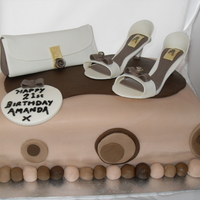 Handbag And Shoes Cake This cake was a rollercoster to make. started with the shoes and bag which I loved and I was thinking the base of the cake would be so easy...