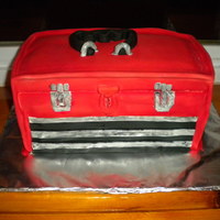 Toolbox Cake Carved Toolbox Cake, Almond Buttercream filling with Fondant covering.