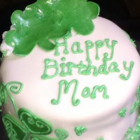 Shamrock Cake Chocolate Cake w/ cookies and cream filling wrapped in MMF