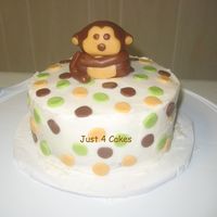Monkey Cake Made this small cake for my friend since I cant make her baby shower. The cake resembles her baby's bedroom. Monkey is made of fondant...