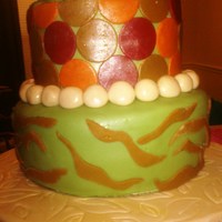 Fall Themed Bridal Shower This is a 2 tier bridal cake. The bottom tier is Choc cake with rasberry fill, the top tier is vanilla with chocolate ganache and choc fill...