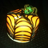 Spider Catching A Fly This is a delicious french vanilla cake with strawberry fill and vanilla/almond buttercream. The spiderweb drapes over the entire cake and...