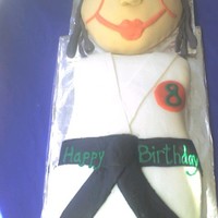 Karate Girl This was my very first fondant cake in 2008 - she had a Karate party and got to cut the cake with a samurai sword so what better thing than...