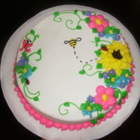 Spring Cake Another cake made just for fun. Red Velvet Cake w/cream cheese and mini choc chip filling. Iced and decorated with buttercream.