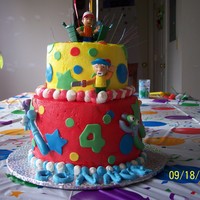 Handy Manny Buttercream frosting with fondant accents. All tools were handmade. Handy Manny and Grandfather with boat are toys.