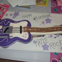 Guitar Cake I made this for my niece's 6th Birthday..String's could use some help.