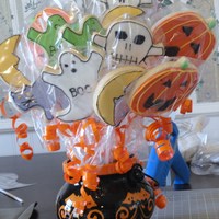 Halloween Bouquet This was my first attempt at decorated cookies ...I wasn't happy with them, so I figured putting them in a bouquet with ribbons and a...