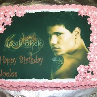 Jacob Black Cake Cake for my daughters 9th birthday. Double chocolate cake with buttercream icing. Edible image with buttercream flowers.