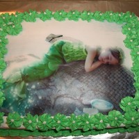 Mermaid Cake Made this cake for a friend. She had her daughters pictures made, and so we used the image on the cake. We also made matching cupcakes. Her...