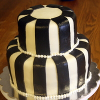 Striped Cake This was a last minute cake for a surprise party cake. The customer put a tiara on top.