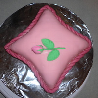 Single Rose Left On A Pillow. This is my first pillow cake. It is the smallest in the set, 6". I was hoping to be able to place a doll cake on top, but the pillow...