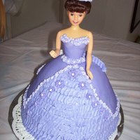 Purple Doll Cake This was a present I made for my cousins birthday, she's 6. It is the first doll cake I've made and look forward to making the...