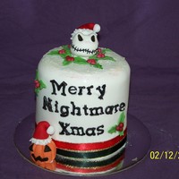 Nightmare Before Christmas 4 inch fruit cake covered in RTR (fondant) decorated with Fondent/gumpaste figures jack skellingon head and pumpkins and holly thx for...