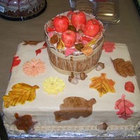 Thanksgiving/fall Apple Barrell WASC w/ vanilla buttercream, leaves and barrel made with 50/50 fondant gumpaste mix, and apples are RKT. This was my first time doing...