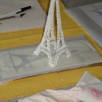 Eiffel Tower Royal Icing Made with tips 2 & 3. Broke before I could attach the 4th side! Oh well, it was fun to make...