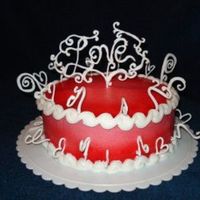 Love Cake Buttercream with red/ pink gradient, royal icing border and decorations.