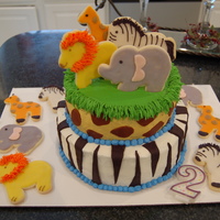 Jungle Animal Cake My first 2-tiered cake...Jungle/Zoo Animals with Decorated Sugar cookies on top :)