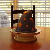 Wizard Hat Baked in a bowl, and shaped the top with rice krispies treats. It's supposed to have an old look to it with the "patch"