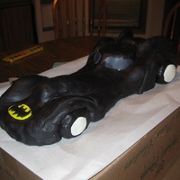 Batmobile Rice krispie covered in white chocolate and marshmallow fondant