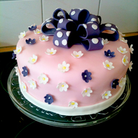 My Very First Cake (Didn't Go To Class) This is my very first cake, bow and flowers...I didn't go to a class, but learned online (you tube, CakeCentral etc.)I love making a...
