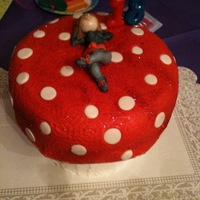Toadstool Birthday cake for a friend. maid a toadstool with her on top, white cake, with bc frosting and fondant for the person.