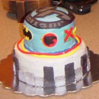 View From Side. Two tier faux fondant Justice League cake for my dh's birthday. This was my first attempt at making a cake. It was a surprise for dh&#...