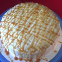 Yummy Cake Butter pecan cake with buttercream filling and icing with caramel drizzle on top