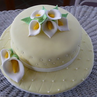 Cala Lilies First fondant cake and first time making cala lilies. thanks for looking