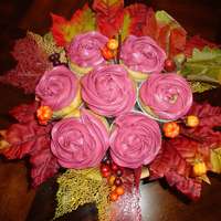 My Second Cupcake Bouquet Yellow cupcakes with bc frosting - burgundy color.