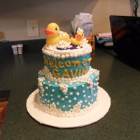 Rubber Ducky Baby Shower Cake Buttercream Icing. 4 layers. Filled with cream cheese.