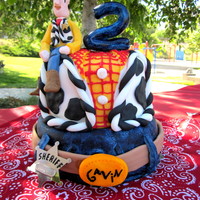 Woody Cake Woody cake for my friends son who turned 2 today. I had a heck of a time with piping the red on the shirt, but thats what I get for buying...