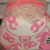 Coach Purse This is my first ever purse cake. It is supposed to be Coach, but since I was too scared to pain the "C" on the cake so I found...