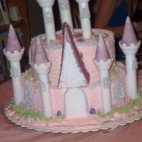Princess Castle Cake My grandbaby's first Disney Princess party. The theme was Disney Baby Princesses.So I made a lovelake Castle cake with lots of detail...