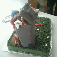 Boy Looking In Wheelie Bin Chocolate cake covered in chocolate fudge frosting and buttercream grass. rice krispie treat boy on fondant box looking in a wheelie bin...