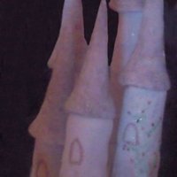 Castle Chocolate cake covered in fondant, painted with colouring and dusted with glitter.